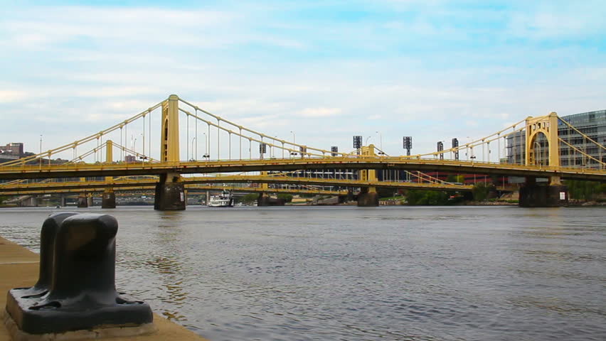 A riverboat travels under the many bridges in Pittsburgh, PA.