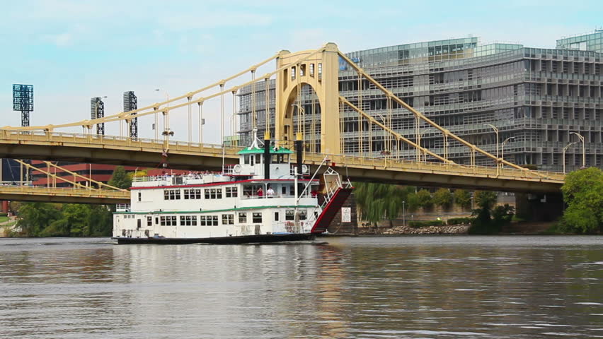A riverboat travels under the many bridges in Pittsburgh, PA.