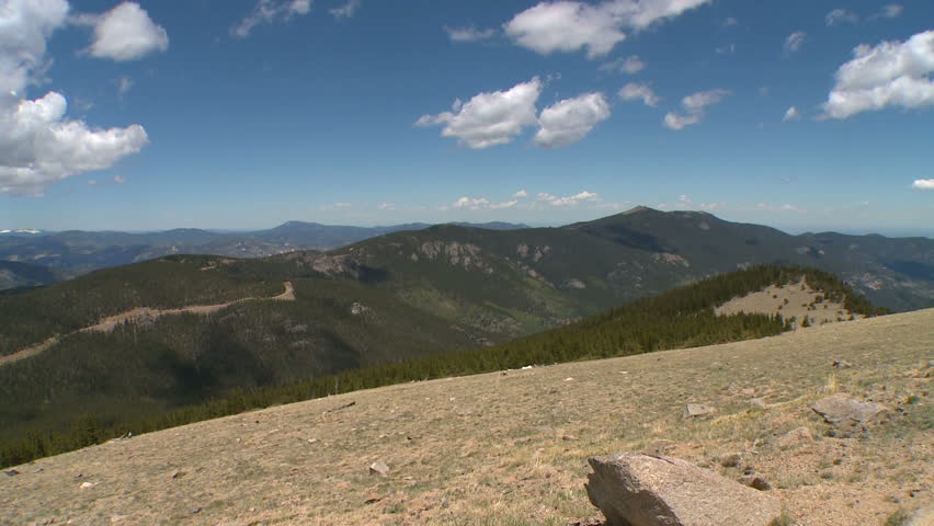 camera pans across a view of the Rocky Mountains