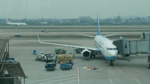 Nov.28,2015-Hangzhou,China:  airplane parking on apron, ground servicing