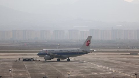 Dec.15,2015-Kunming,China: airplane driving on runway