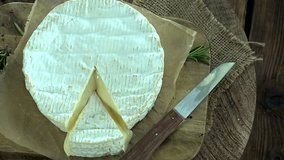 Portion of creamy Camembert (4k footage; loopable)