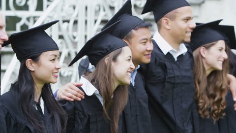 Graduation Caps Are Tossed Into の動画素材 ロイヤリティフリー Shutterstock