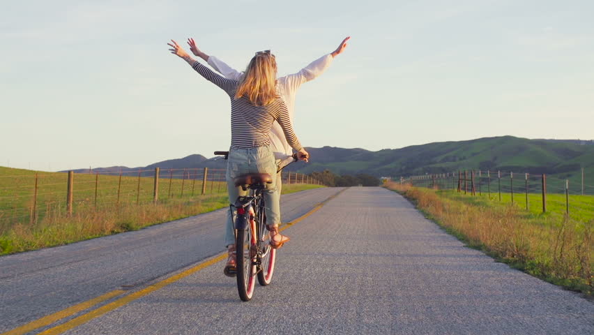 two girls on bike