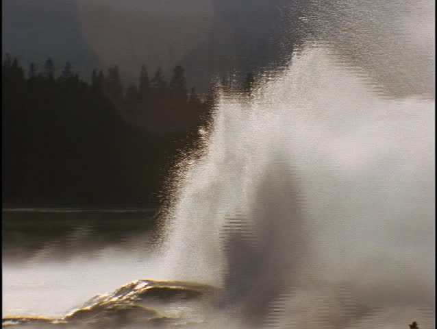 Old Faithful geyser erupts in Yellowstone National Park.