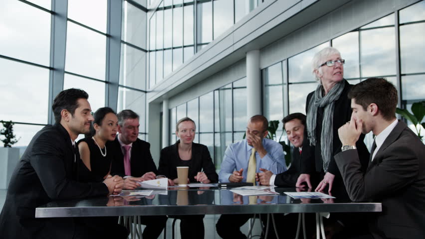 4k / Ultra HD version A confident and happy business team are holding a meeting in a light, modern office building. They are discussing ideas for their business development. Shot on RED Epic | Shutterstock HD Video #14127647