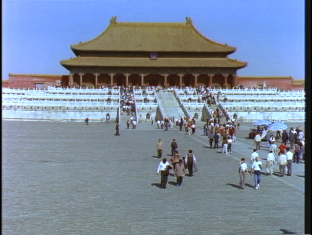 Crowds of visitors walk at Beijing Imperial Palace in China.