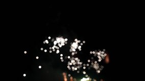 Close up of unfocused firework pyrotechnic show 