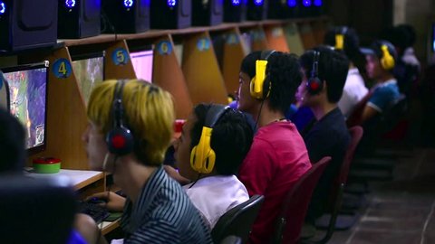 VUNG TAU, VIETNAM - JANUARY 25, 2016: Unidentified young gamers play video games at one of city computer game clubs.