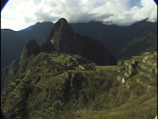 The ancient ruins of Machu Picchu lie in the mountain hillsides of Peru.