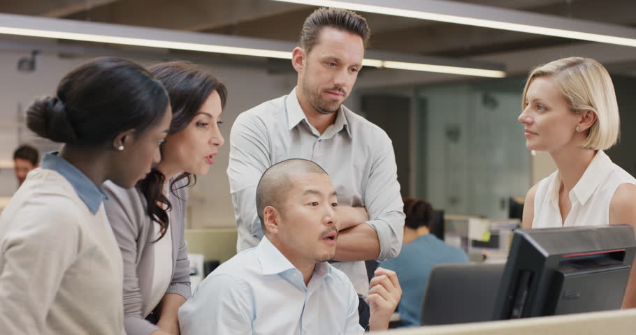 Creative business team meeting in modern glass office multi ethnic group of people working over computer screen on combined teamwork project Royalty-Free Stock Footage #14141801