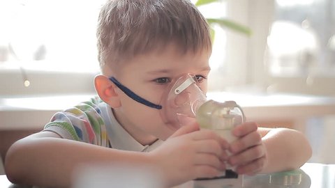 Child with inhaler 10