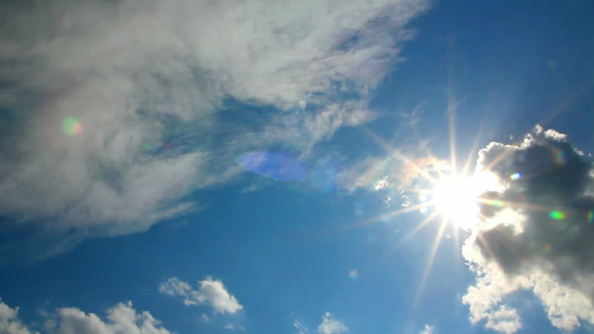 clouds and sun on blue sky