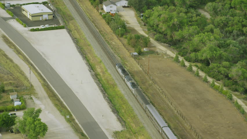 4k / Ultra HD version Aerial view of American freight or transport train. California, United States of America public transport. Shot on RED Epic