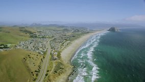 4k / Ultra HD version Aerial view of California Coastline along the Big Sur. USA homes line the cliffs overlooking the blue ocean. Shot on RED Epic