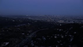 4k / Ultra HD version Aerial view of Los Angeles, California at night. Helicopter shot over homes and business buildings in American suburbs. Shot on RED Epic