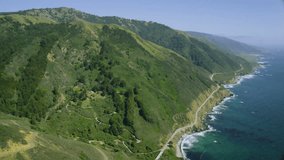 4k / Ultra HD version Aerial view of California Coastal road. Helicopter flying along Big Sur coast near San Francisco with the Pacific ocean and State park mountain range. Shot on RED Epic