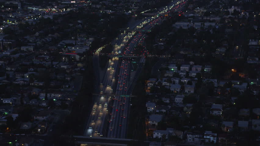 4k / Ultra HD version Aerial view of Los Angeles, California at night. Helicopter shot over homes and business buildings in American suburbs. Shot on RED Epic | Shutterstock HD Video #14167997