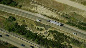 4k / Ultra HD version Aerial view of truck following Californian coastline and Big Sur. USA highway road overlooking the blue ocean. Shot on RED Epic