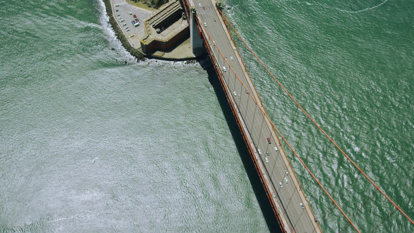 4k / Ultra HD version Aerial shot of Golden Gate Bridge San Francisco city. Helicopter view of iconic engineering span across the bay. West coast California State. Marin County, USA. Shot on RED Epic