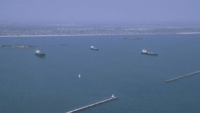 4k / Ultra HD version Aerial shot of container ship in at sea near Los Angeles container shipping Port Shot on RED Epic