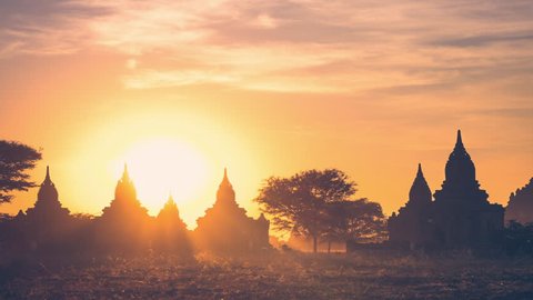 Time lapse of amazing sunset colors over ancient Buddhist Temple silhouette at Bagan. Myanmar (Burma) travel landscape and destinations