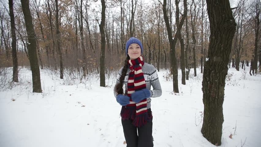 Sportswoman Runs in winter park