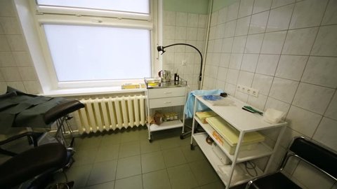 The observation room with a chair and medical tools in gastroenterologist office