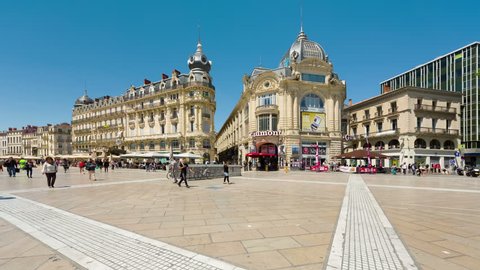 MONTPELLIER, FRANCE - MAY 22, 2015: People are walking on the Place de la Comédie square in Montpellier, one of the main focal points of the city.