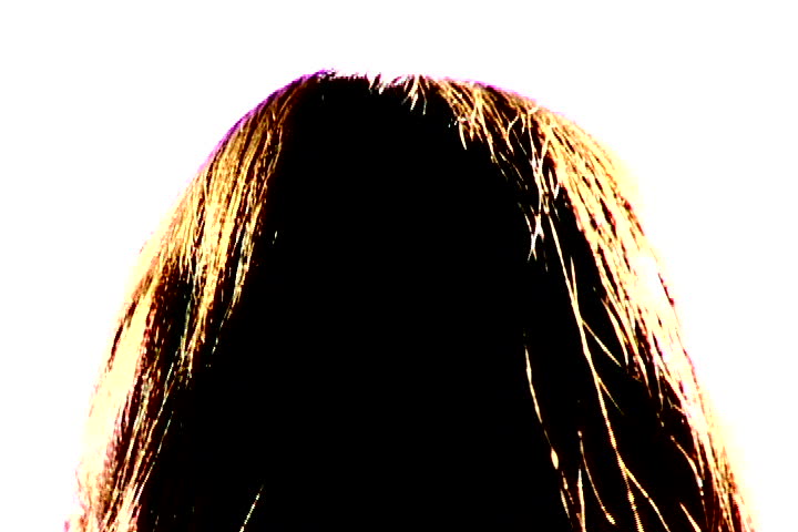 Color zoom out of a woman dressed like an angel