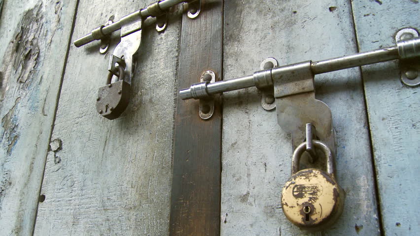 Chamba, India - CIRCA 2013 - View of two locks on old door | Shutterstock HD Video #14191289