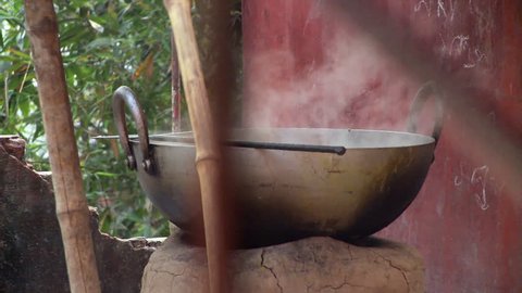Baruipur, India - CIRCA 2013 - Closeup view of large steaming pot