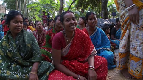 Baruipur, India - CIRCA 2013 - Women sitting on ground in traditional dress