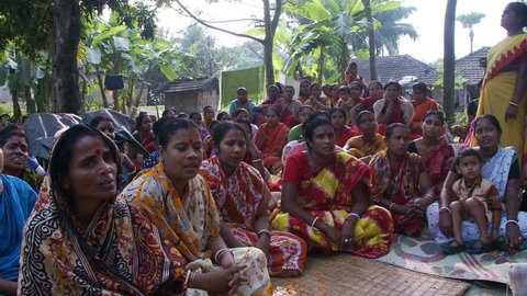 Baruipur, India - CIRCA 2013 - Women chanting at women meeting