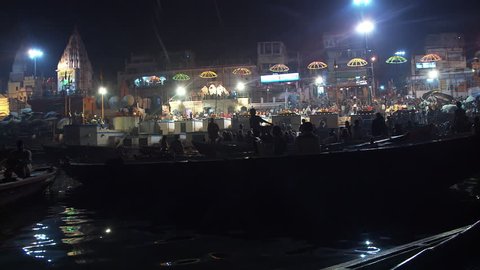 India - CIRCA 2013 - Nighttime shot of boats along the Ganges river shoreline in India.