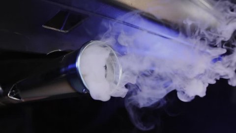 Smokey Car Exhaust / HD footage of a smokey exhaust pipe. Video footage can be sped up or slowed down if desired.