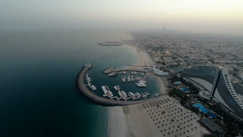 Jumeirah Beach near Burj Al Arab hotel in Dubai, UAE. Helicopter view