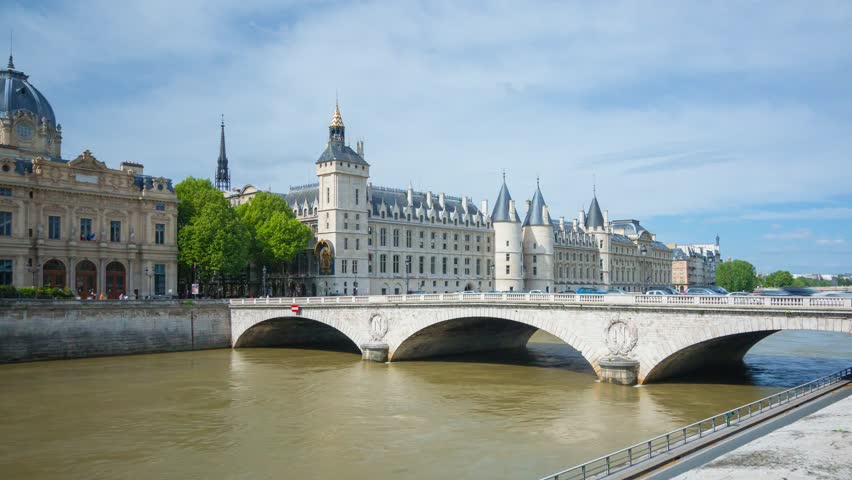 PARIS - MAY 2015: La Conciergerie castle on Site river