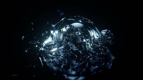 Breaking glass sphere in slow motion on black background
