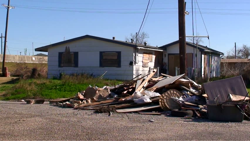Shots of boarded up homes