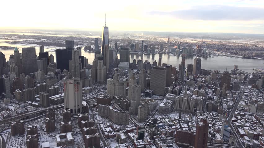 New York City SUNSET, DOWNTOWN below Canal, Manhattan, 4k aerials post January Blizzard, 2016. Shot from photo aircraft, open window, no plastic.