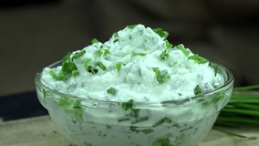 Portion of Herb Curd (rotating 4K footage; seamless loopable)