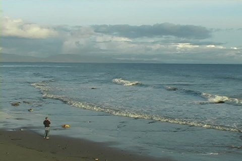 A man photographs the Pacific.