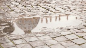 the dome of the Vatican is reflected in a puddle - Powered by Shutterstock - Get 15% off with code: PIKWIZARD15