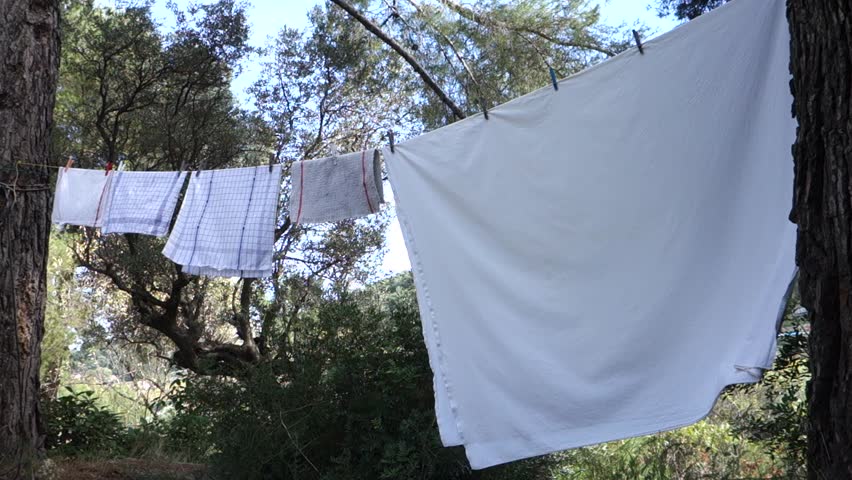 washing clothes - laundry on a clothesline, suited well for metaphors like dirty laundry, cleaning old things etc.