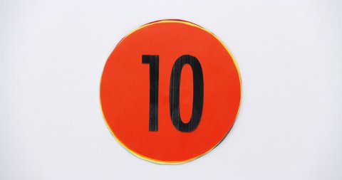 Countdown leader graphic 10 to 0. Stop motion animation with color paper.
