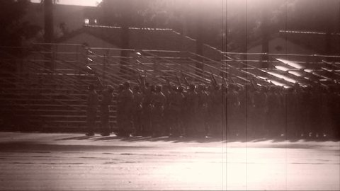 Archival shot of Marines practicing drill