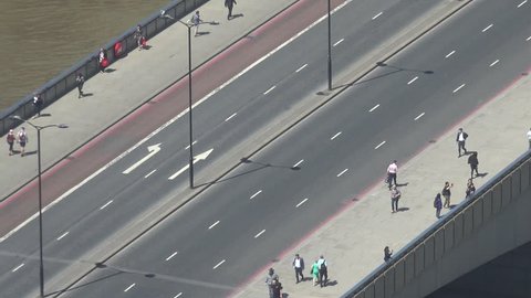 LONDON - ENGLAND, JUNE 5, 2015, 4K Timelapse of traffic car and pedestrian people on the bridge day
