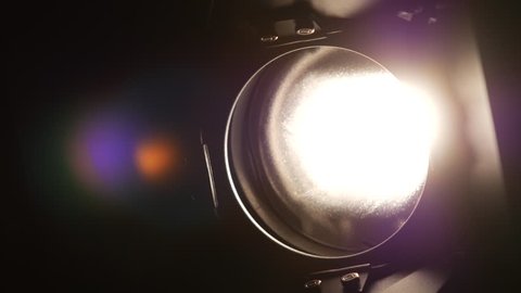 Lighting equipment, flash or spotlight, on and off, black, close up