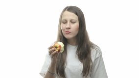 Brunette woman eating apple, fifth video from the series